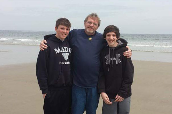 Photo of Danielle’s family on the beach
