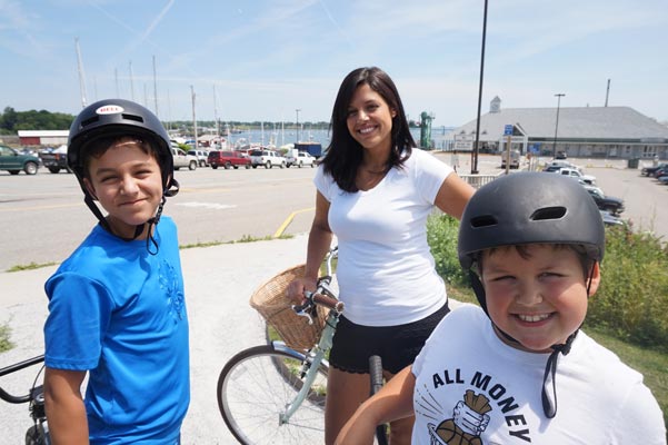Photo of Emily and her boys on bikes